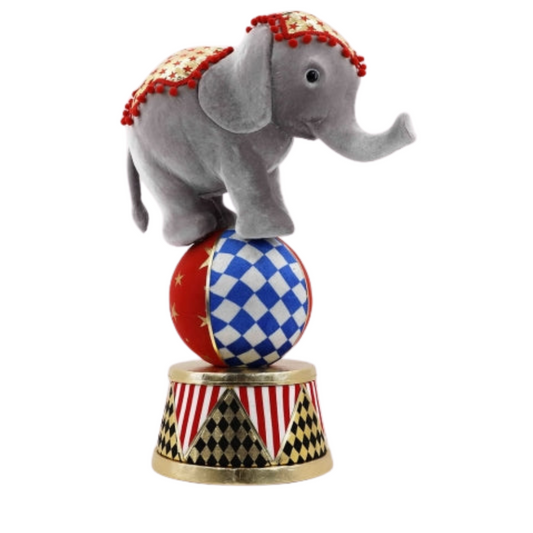 ELEFANTE DE CIRCO SOBRE PELOTA